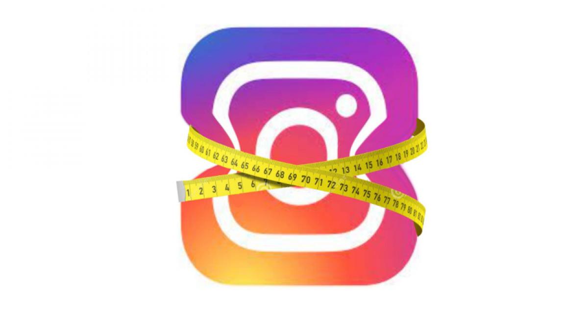 the Instagram logo squeezed in the middle by a tape measure
