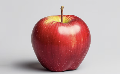 a red apple against a white background